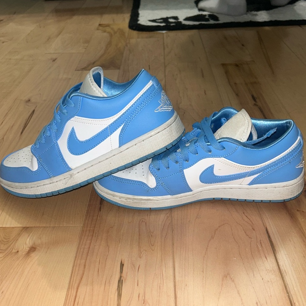 Blue and white Nike jordan lows